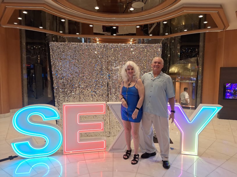 Lifestyle couples on a swinger-friendly vacation with Hugh & Judy, laughing and having fun at a tropical resort