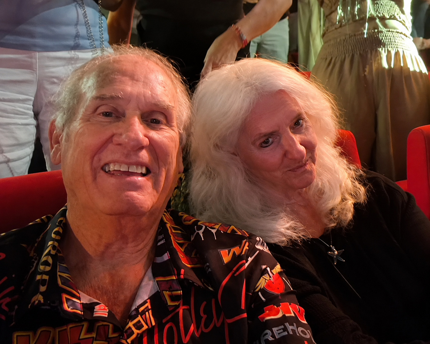 Hugh and Judy taking a theater selfie during a Virgin Voyages show